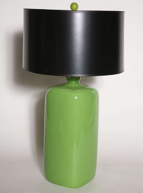 Glazed ceramic table lamp goes lime-green in a rounded rectangular silhouette. Ceramic body: 17