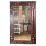 A Flemish Baroque Style Faux Tortoise Shell and Ebonized Mirror