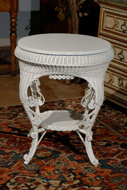 A wonderful wicker table with cabriole legs.