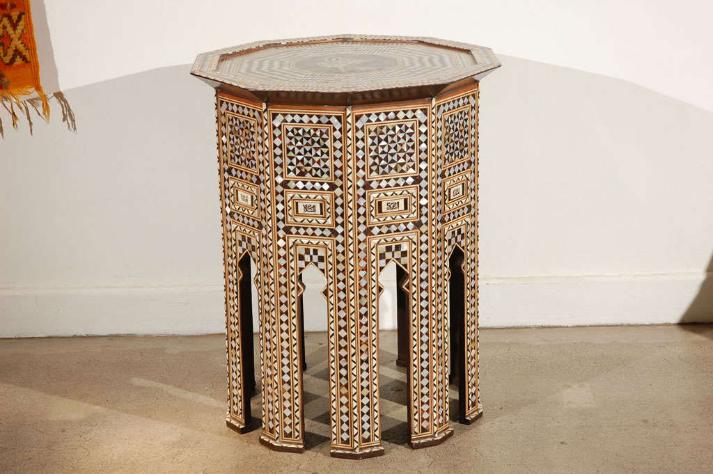 Large Syrian antique 19th century mother-of-pearl inlay tables.
Moorish style Middle Eastern ottoman tables, outstanding very rare to find pair of mosaic-work inlay pedestal high tables. Because the table tops bear the seal of Sultan Mehmet V., we