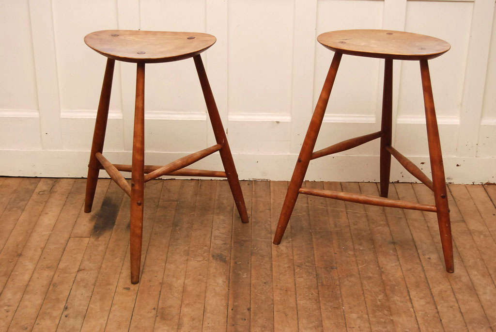 pair cherry stools<br />
delicate design and construction by Wharton Esherick<br />
splay legs support thin seat