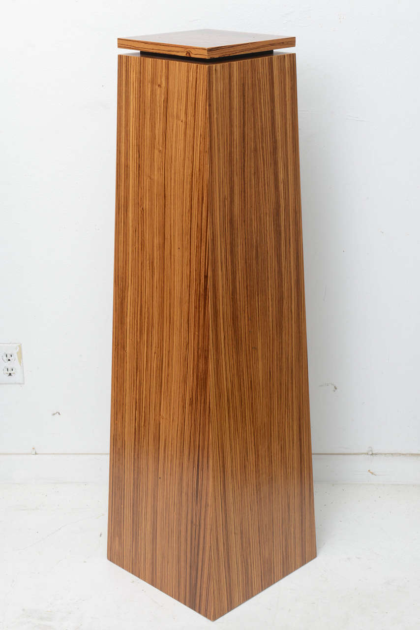 Art Deco style pedestal, made in Zebrano wood. 

Top of pedestal measure 10" x 10".

Please feel free to contact us directly for a shipping quote or any additional information by clicking "Contact Dealer" below.