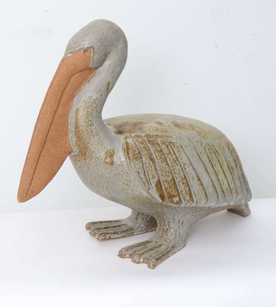 ceramic pelican with fish in mouth