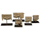 Carved Pine Capital Fragments on Bases