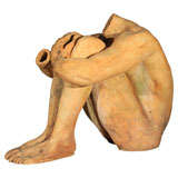 Sculpture of a Seated Headless Naked Man