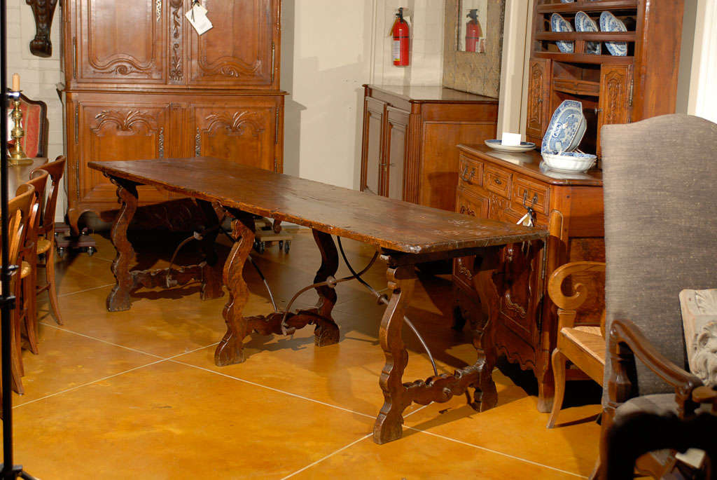 An early Italian walnut fratino table with three  lyre shaped legs and iron stretchers.<br />
<br />
For many more fine antiques, please visit our online gallery at: www.williamwordantiques.com<br />
<br />
William Word Fine Antiques: Atlanta's