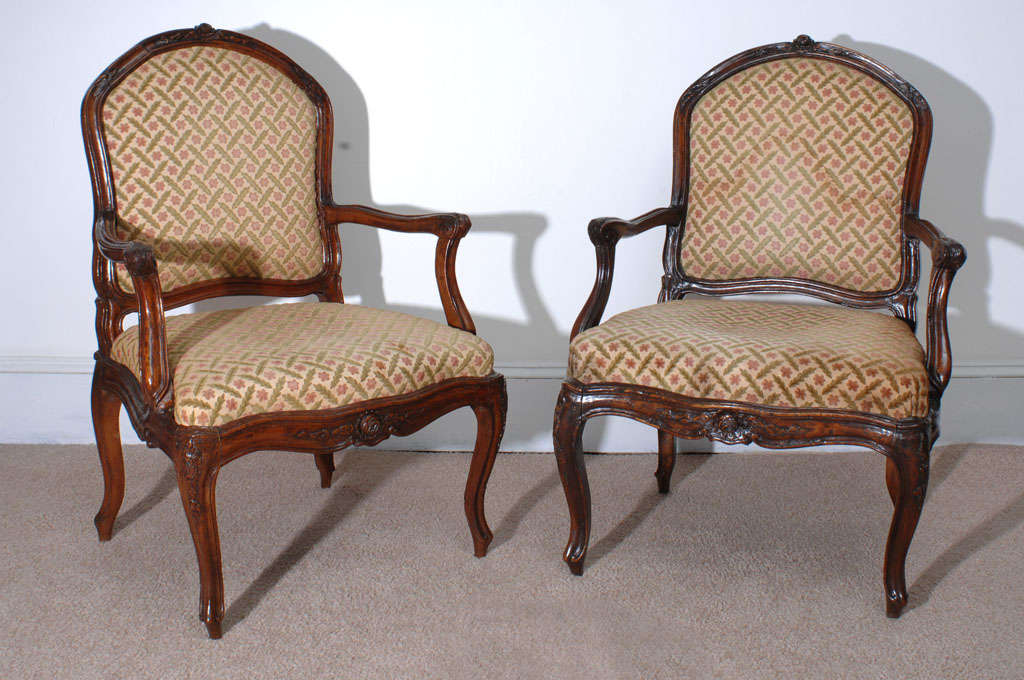 Pair of Provincial Louis XV Fauteuils (open arm chairs)