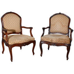 Pair of Provincial Louis XV Fauteuils (open arm chairs)