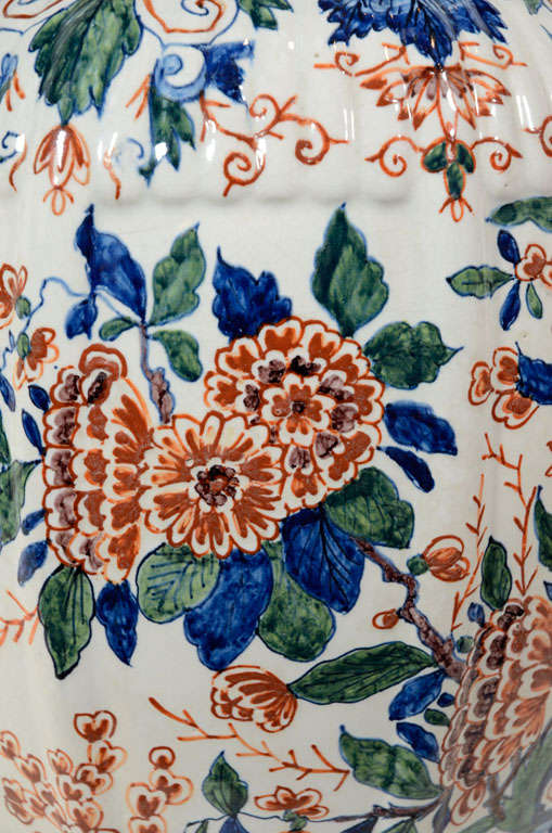 A Pair of Polychrome Dutch Delft Covered Vases