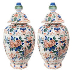 A Pair of Polychrome Dutch Delft Covered Vases