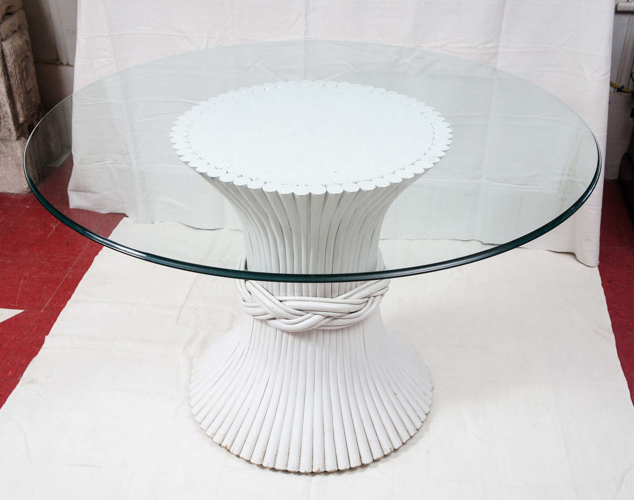 White base is composed of bent wood tapered poles 