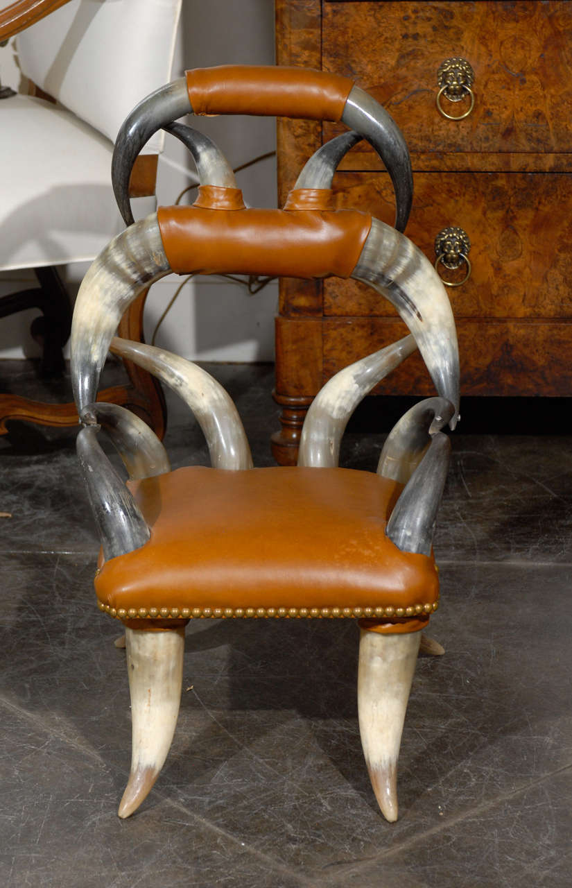 A child’s chair made of steer horns from the American west at the turn of the 20th century. Steer Horn furniture was popularized in the United States in 1876 when the Tobey Furniture Co. exhibited a sofa and chairs made of horns from Texas longhorn