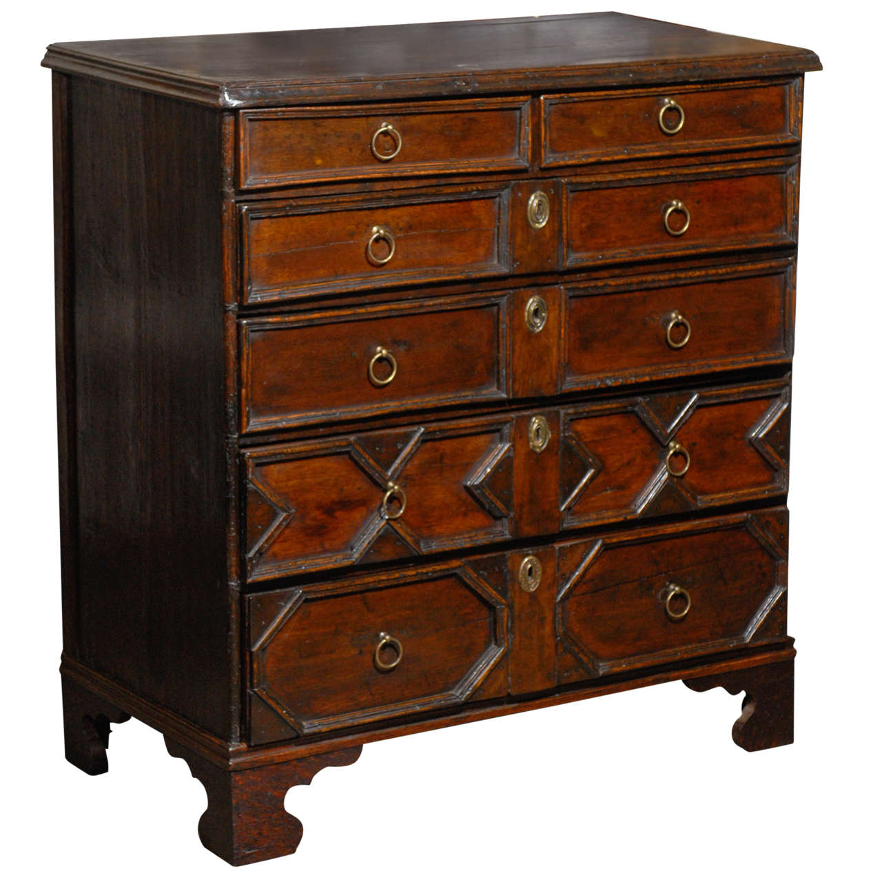 English Oak Early 19th Century Six-Drawer Chest with Geometric Front For Sale