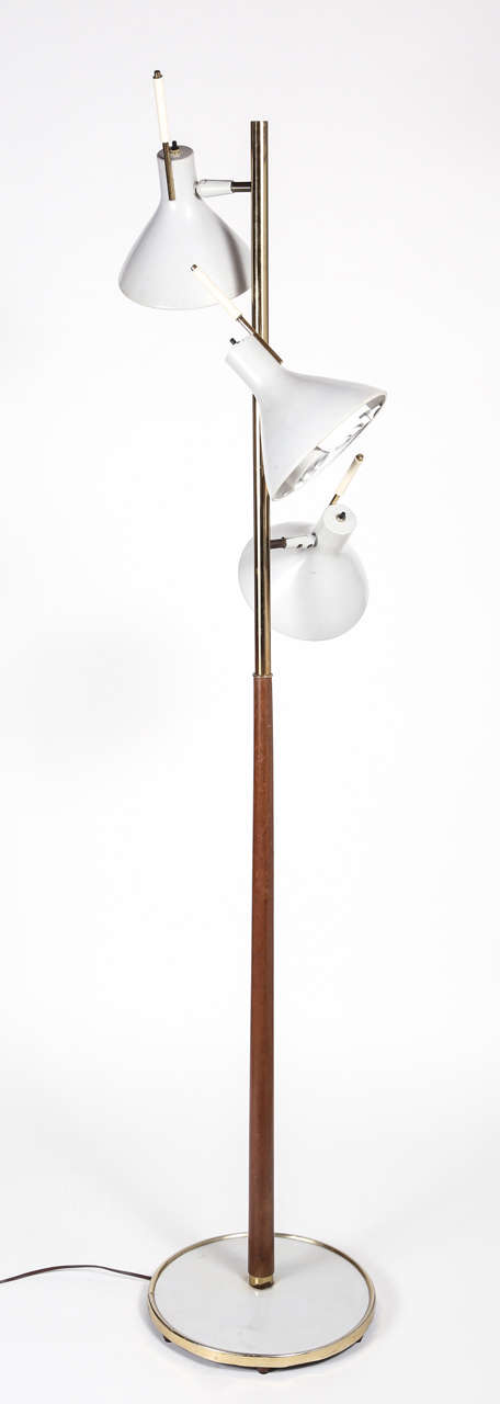 Thomas Moser for Lightolier No. 9732 Floor Lamp with articulating lamp shades.  Made in brass with ebony, walnut and polished brass finishes.