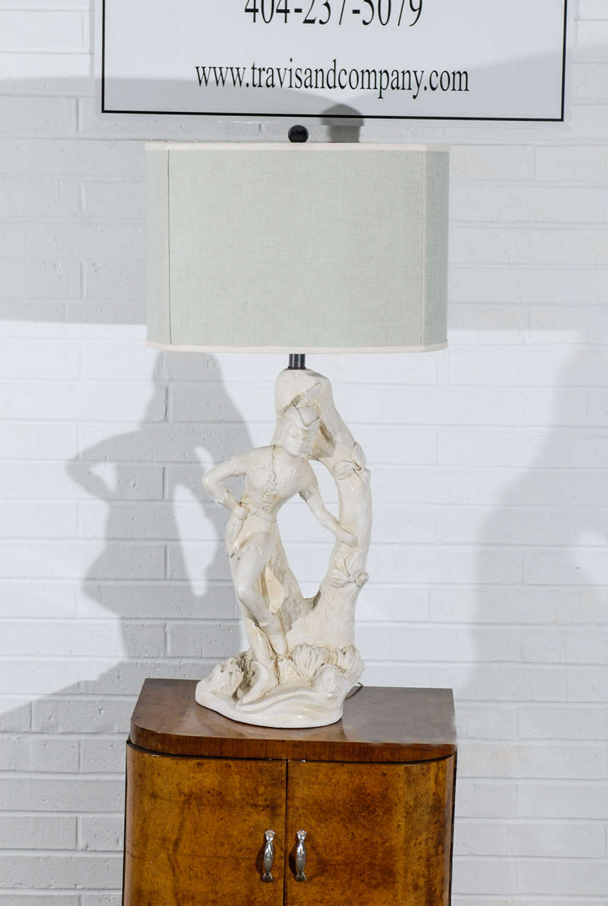 A lovely, whimsical pair of large scale plaster lamps by Continental Art Company, circa 1950. Male and Female figures with fabulous detail. Stunning Hollywood Regency !  Excellent Restored Condition. Rewired using clear cord, new brass 3-way