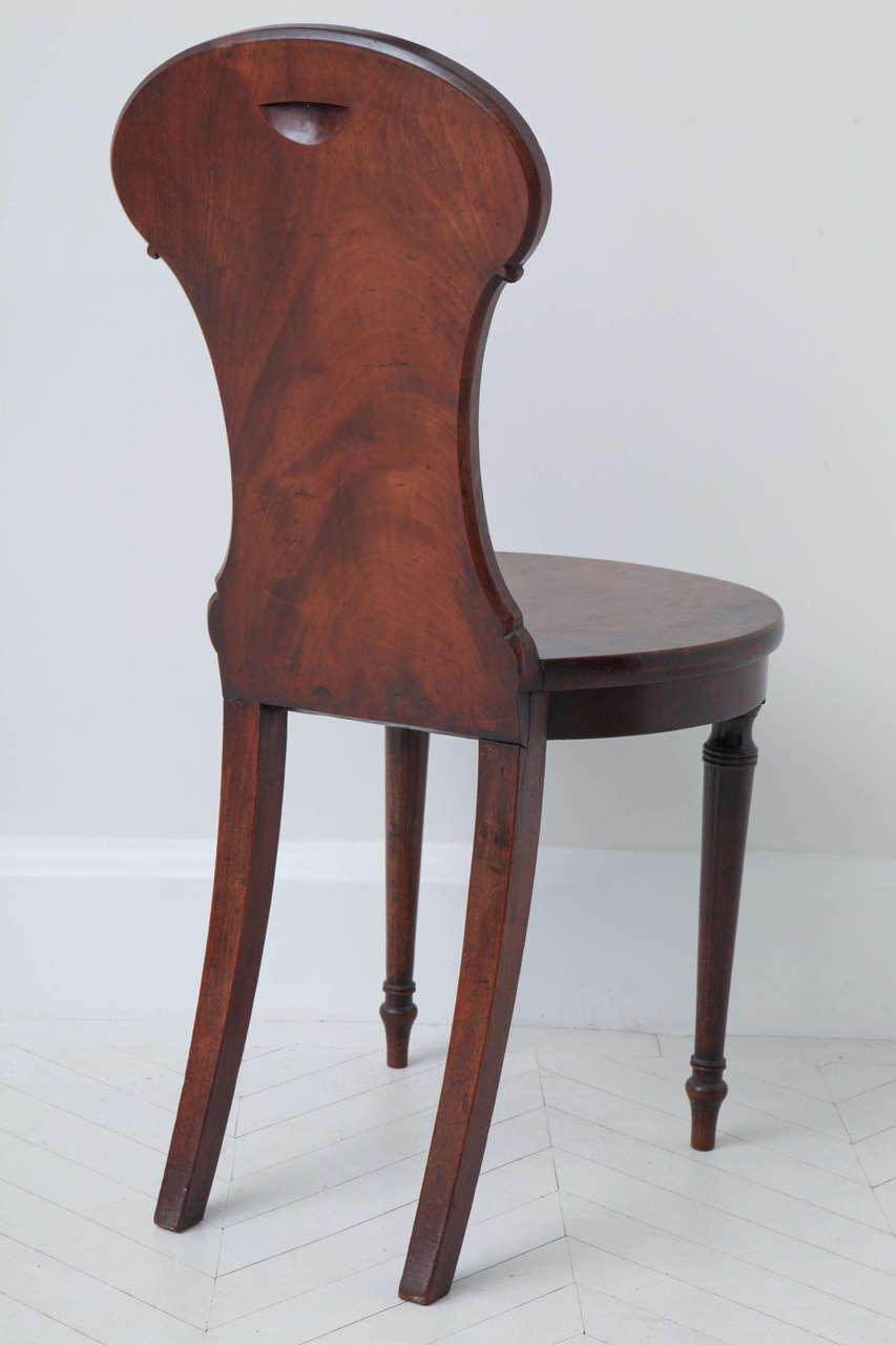 A 19th century English Regency mahogany hall chair 3