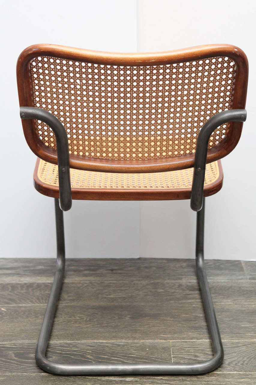 Set of Four Vintage Caned Metal Chairs For Sale at 1stdibs