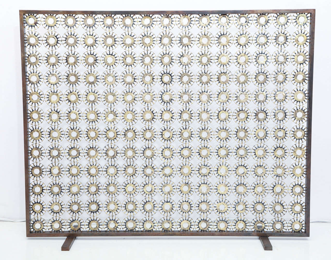 Marie Suri
The laurel fire screen fire screen with 2.5” steel medallions and bronze decoration. Custom inquiries welcome. Mesh backing available for wood-burning fireplaces.
Made to order expressly for Liz O'Brien.