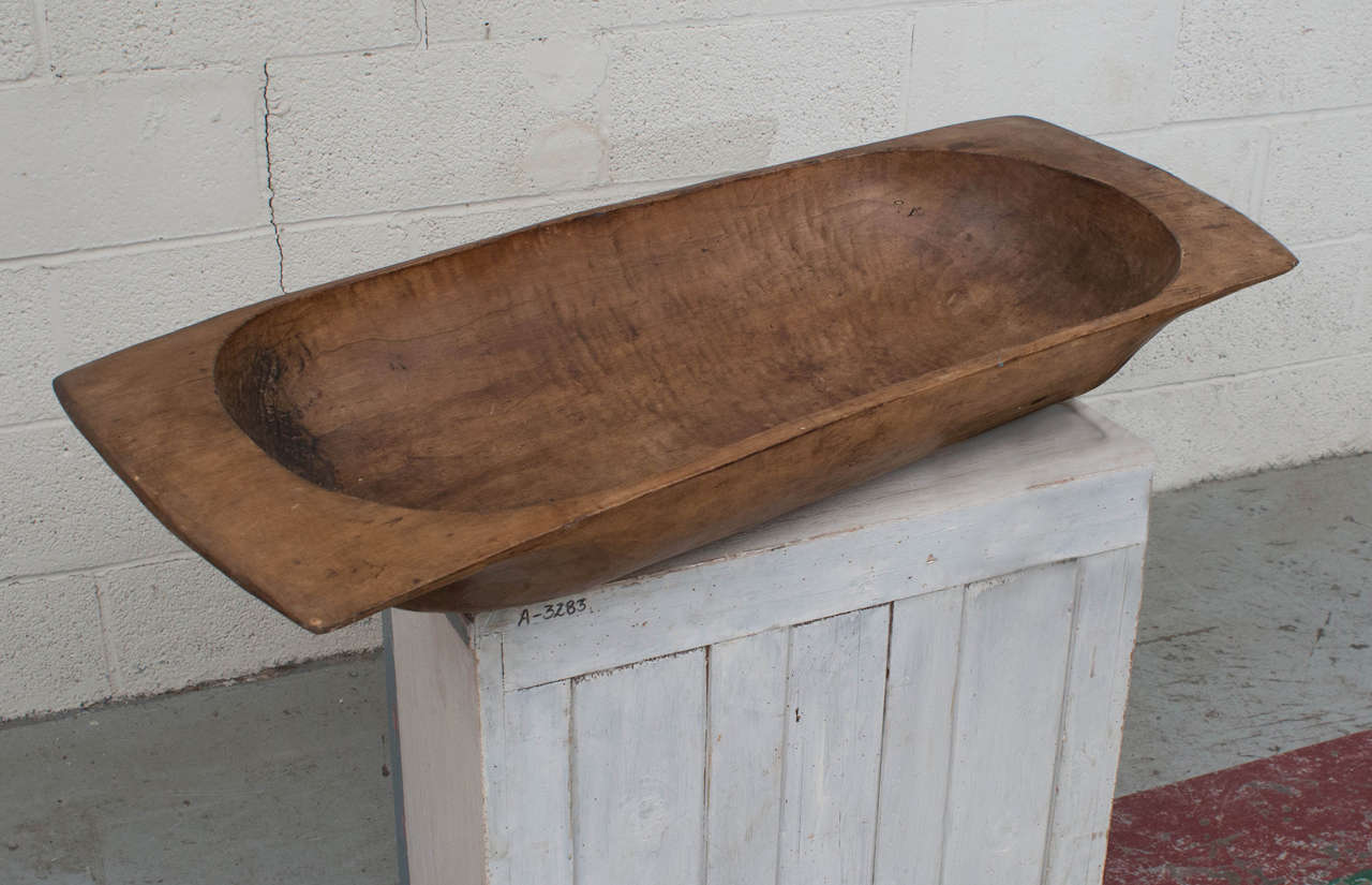 Carved by hand from a single log of elm, this trough (or trog) was probably used for the kneading and rising of dough in bread-making. Great as an all-purpose vessel or centerpiece.