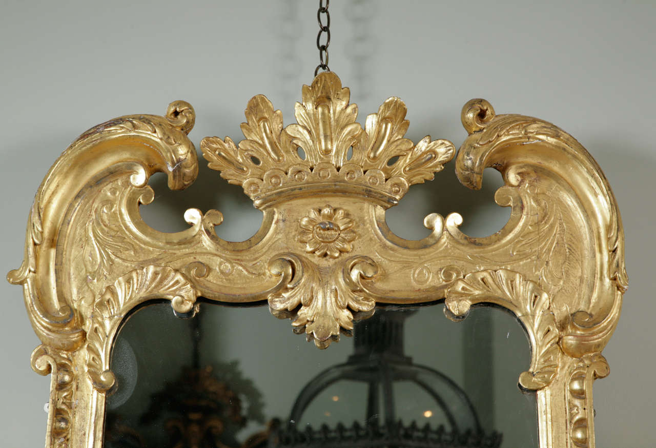 18th Century and Earlier An Unusual 18th Century carved Giltwood Wall Mirror For Sale