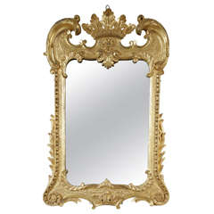 Antique An Unusual 18th Century carved Giltwood Wall Mirror