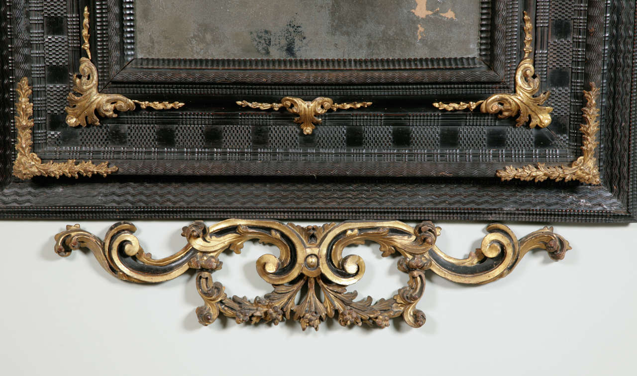 George III An Early 18th Century Venetian Ebonised & Parcel Gilt Mirror.