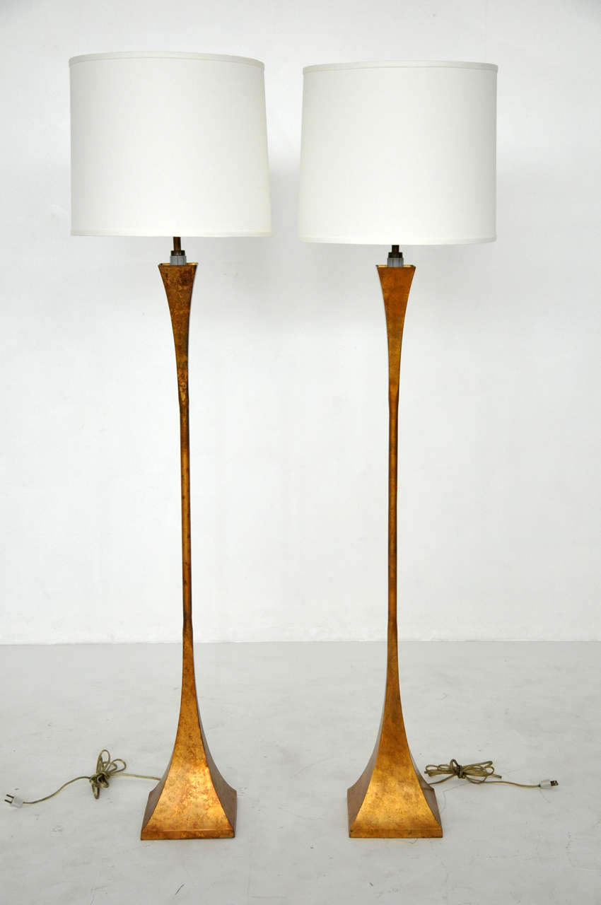 Pair of gilt metal floor lamps by Damon Giffard for Hansen.  New 16