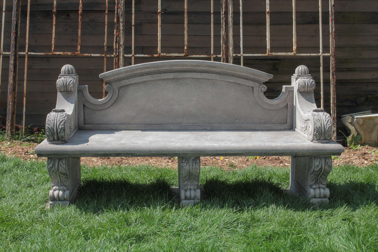 Fabulous hand-carved stone bench of immense scale. Intricate carvings on arms and legs and wonderful patina throughout. The most unique bench in terms of scale and design we have seen.