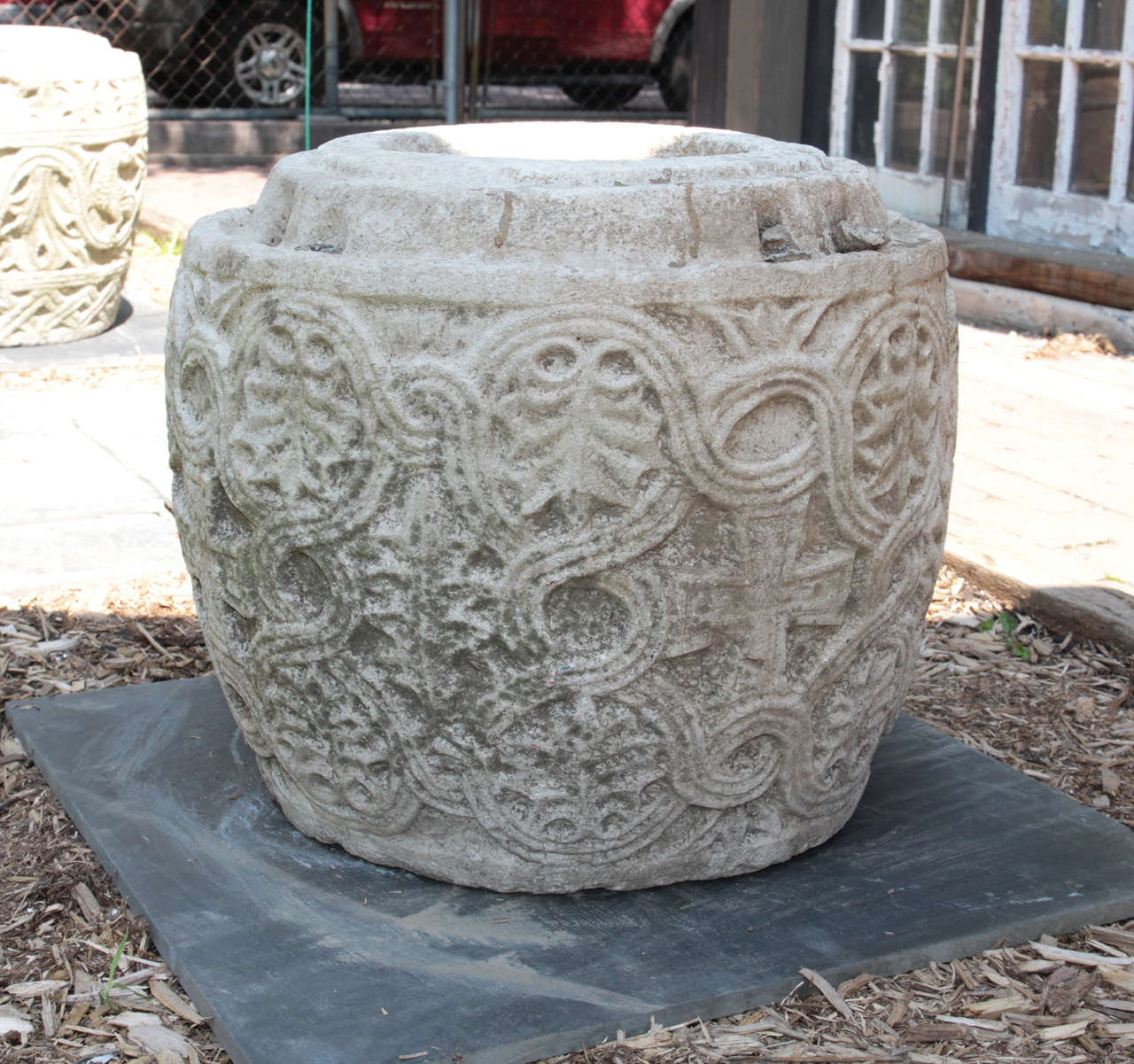 18th century or earlier. Important and rare hand-carved limestone vessel depicting leaves and ancient cross symbols. Most likely originally used to collect water. Fabulous as a planter or garden ornament.