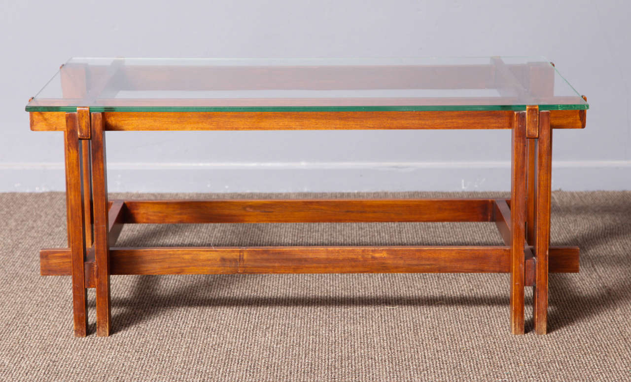 Coffee table by Ico Parisi for Cassina,1960.
Dark rosewood frame and glass top.