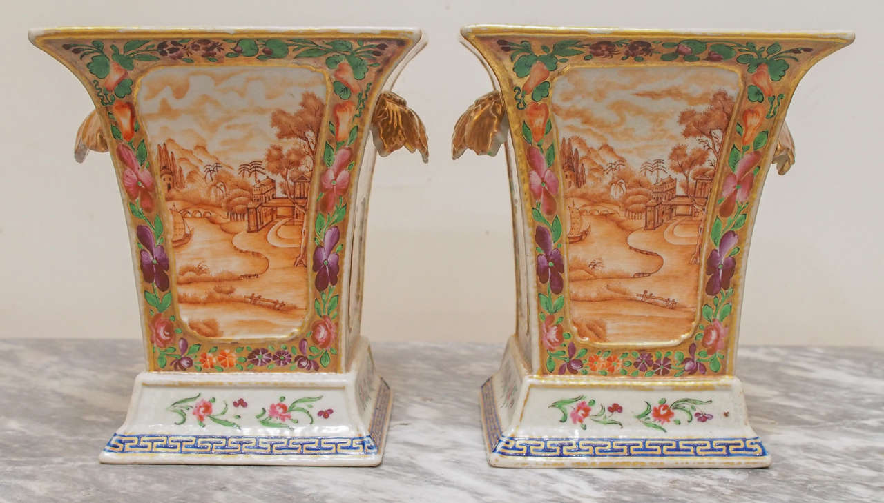 Pair of Chinese hand-painted export bough pots in square form with handles.This pair appears to be lacking pierced top liners.