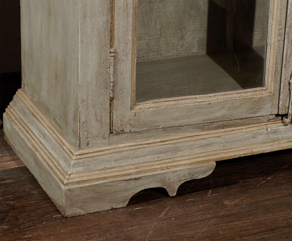 French A Painted Wooden Bookcase with Glass Doors