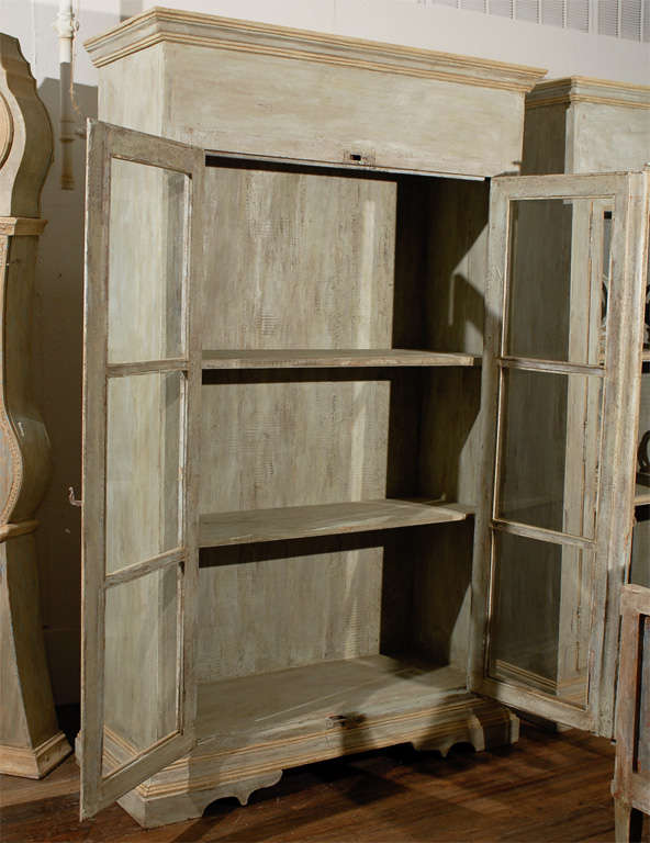 A Painted Wooden Bookcase with Glass Doors 3
