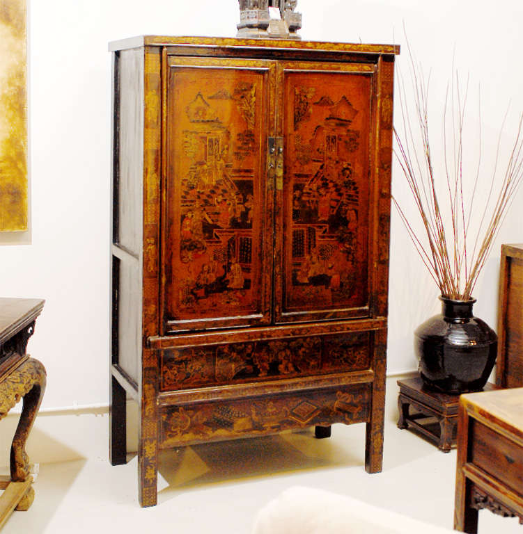 This cabinet is an excellent example of the sophisticated style of Shanxi.  It features classic palace scenes, sacred symbols and ancient emblems, interspersed with medallions of the immortals which are rendered in fine quality gold leaf.  The