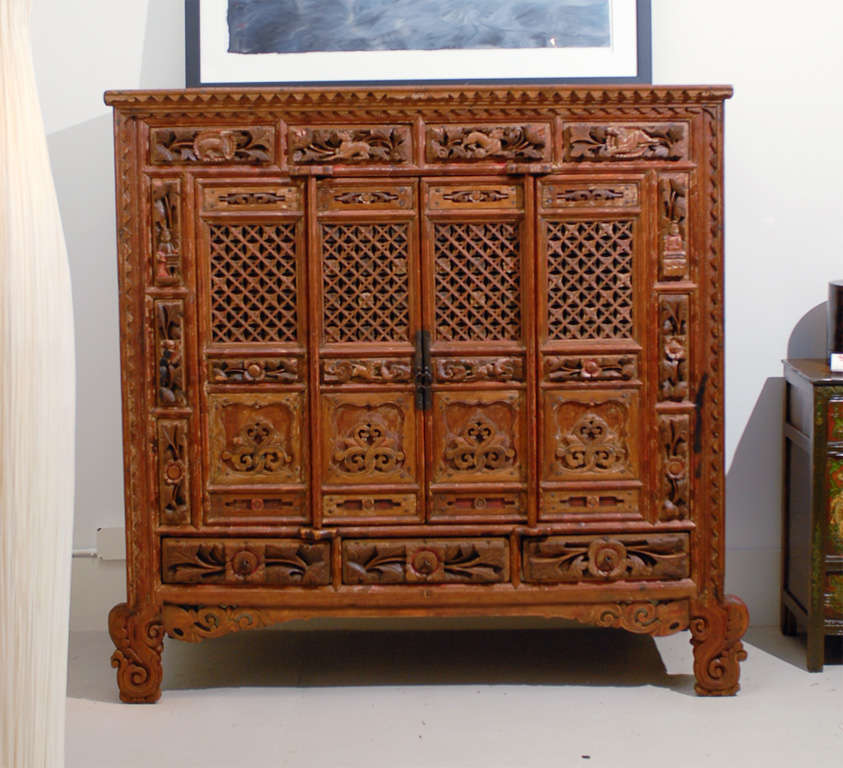 This Song Dynasty storage cabinet was typically used in a home for clothes storage.  Traditional Chinese architecture makes no allowance for built-in closets.  Such cabinets were sought after for their elegant shapes and ornamentation.  This