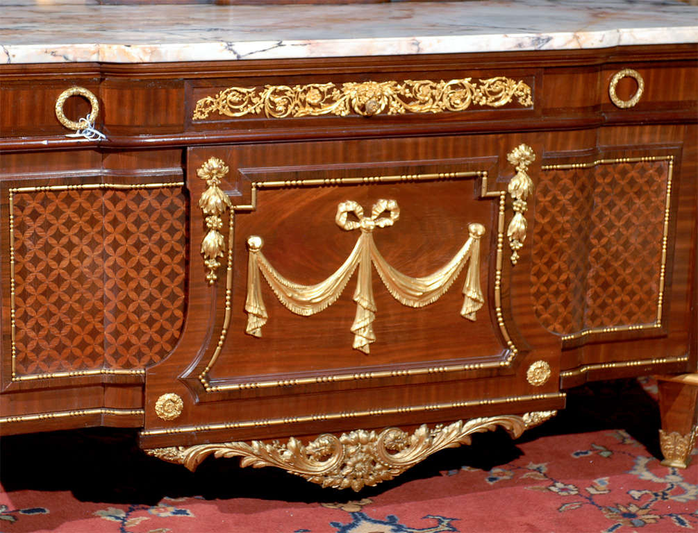 Parquetry Suberb commode with ormolu mounts