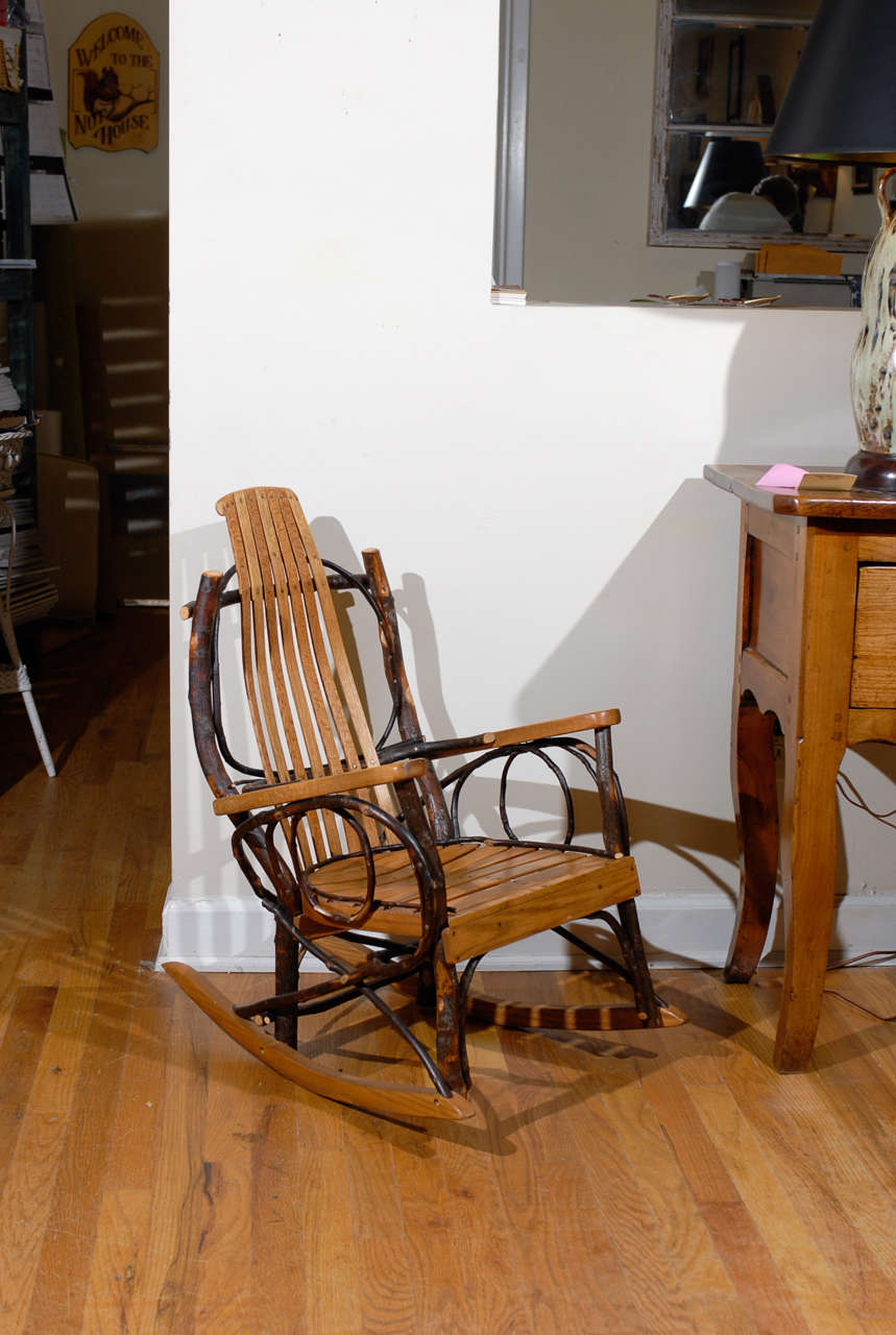 This is a wonderful rocking chair hand made by an Amish Community.  The chairs are made from Hickory and Oak trees.  The rocker is very comfortable.

Please visit our website for more pieces.
www.dearingantiques.com
Dearing Antiques was