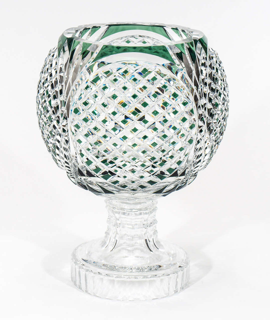 This is a dramatic, large and beautifully proportioned crystal centerpiece or vase signed by Val St. Lambert. The hand blown crystal is overlaid in emerald green and cut to clear and a strong geometric pattern. The 14