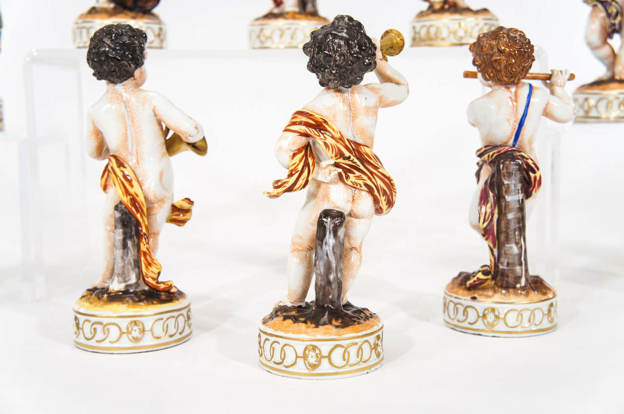 Complete Set of 12 Capo Di Monte Putti Figurines Depicting Musicians In Excellent Condition In Great Barrington, MA