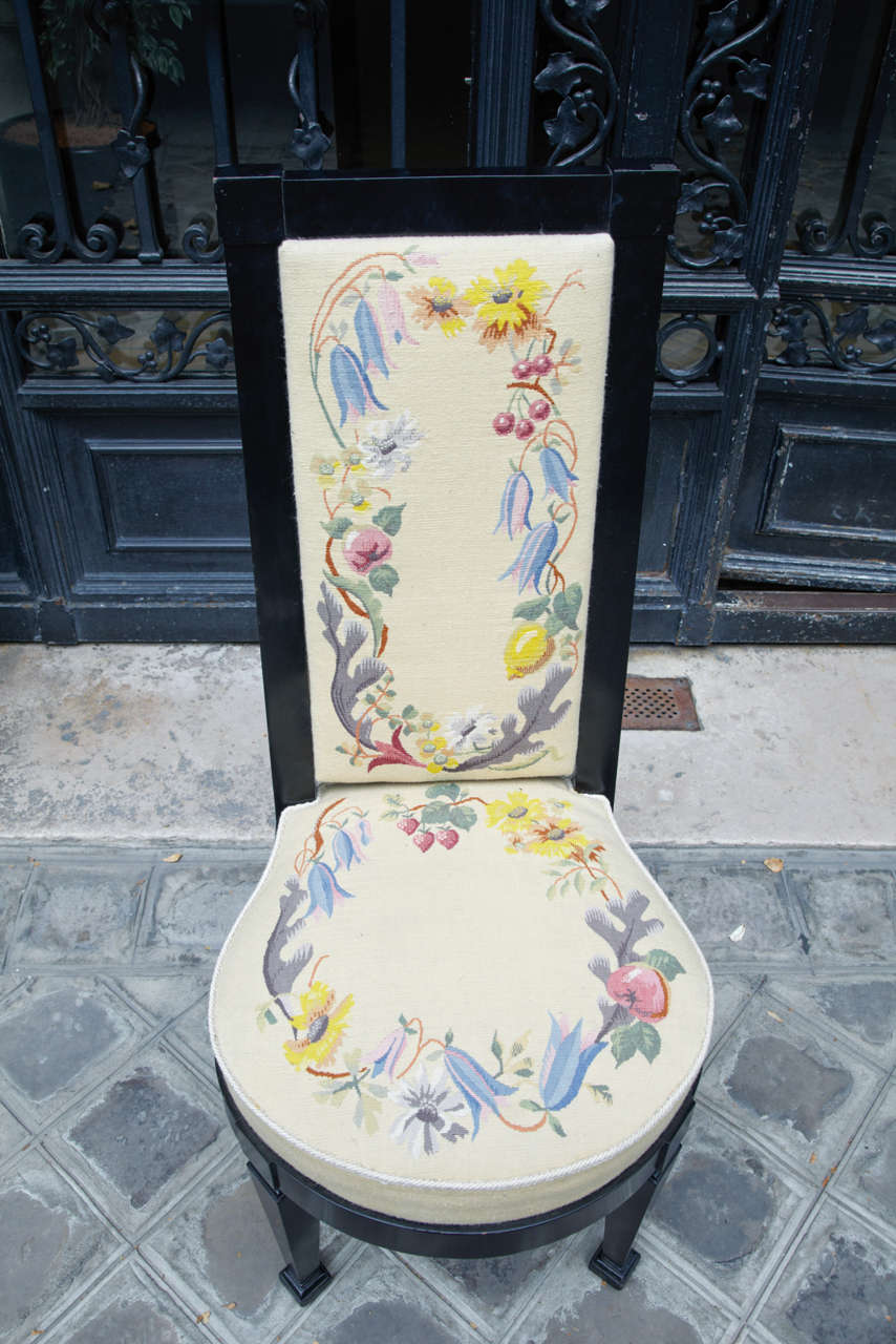 Jean-Charles MOREUX (1889-1956)

Pair of elegant seats in black stained pear-wood, hight back seats and large rounded seatings recovered with Aubusson beige Tapestry with garlands of flowers and fruits motifs.
Sword shaped back legs, 
Circa