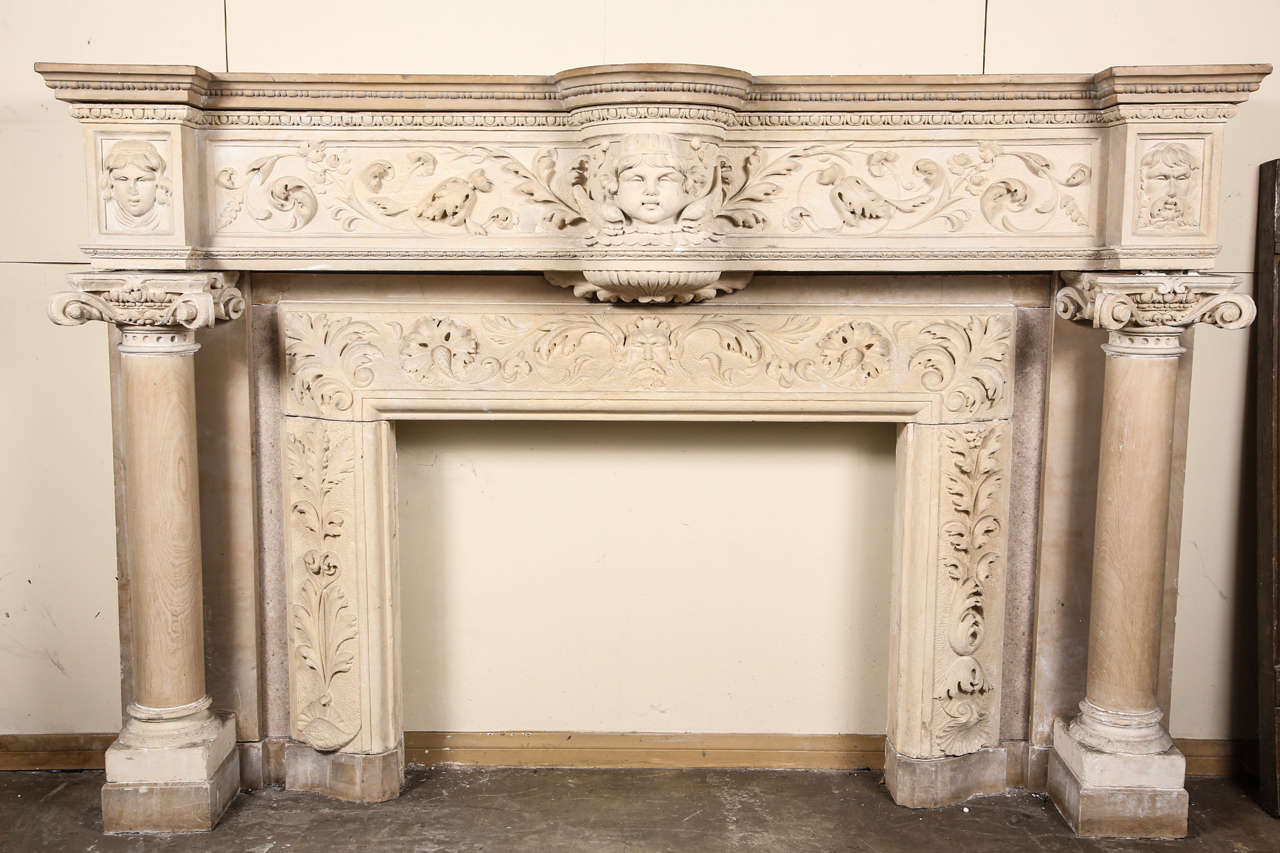 This is a very unusual mantle made of both limestone and marble.  Heavily carved, very detailed and in good condition.