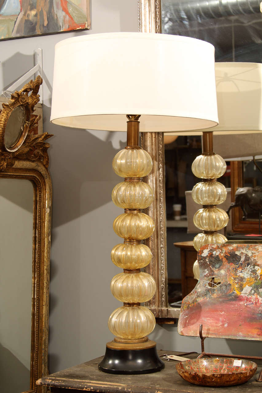 Nice large-scale gold/black Murano glass lamp.