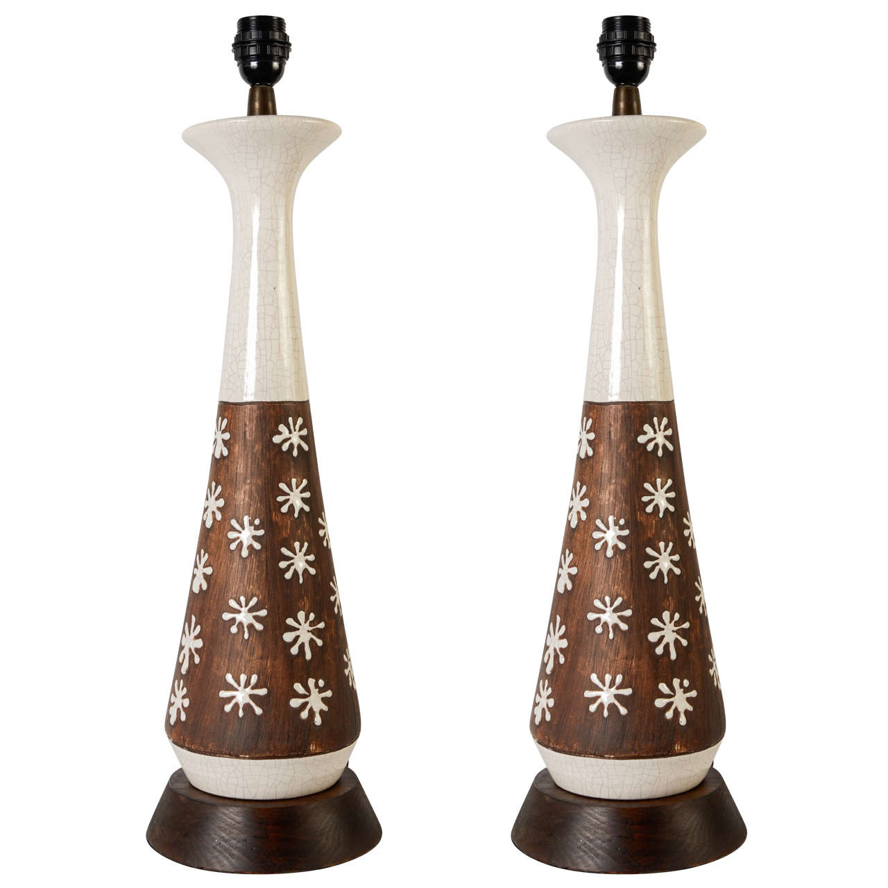 Paire de lampes en céramique dans le style de Jean Besnard en vente