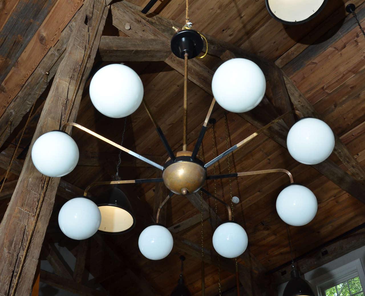 Stunning Italian Mid-Century Chandelier in Plated Aluminum with Eight Opaque Glass Globes.