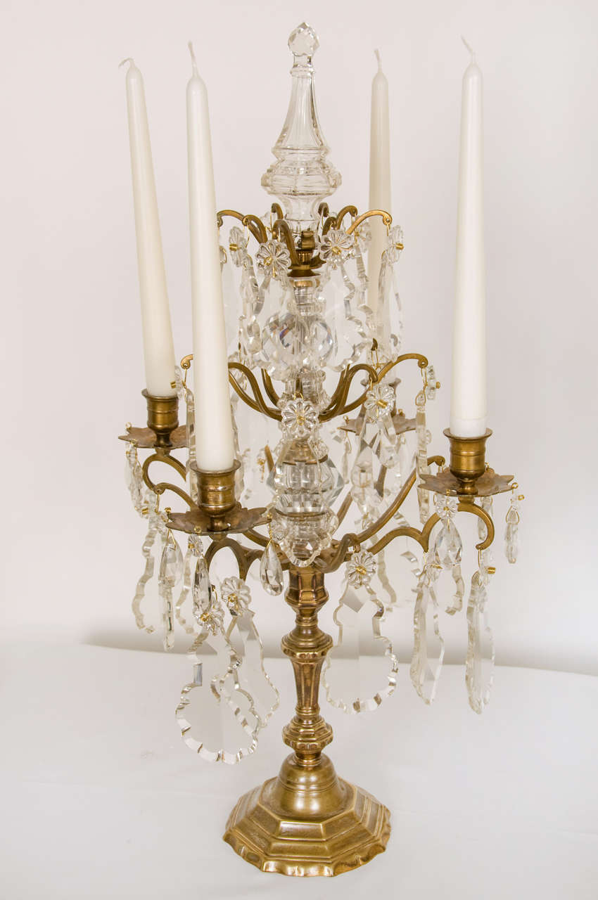 A pair of bronze four light candelabra or called 