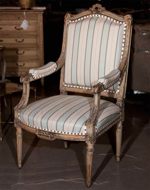 Pair of exquisite French Fauteuil à la reine, in the style of Louis XVI, circa 1940s, each polychromed and distressed frame upholstered in striped silk, raised on fluted tapering legs. By Maison Jansen.