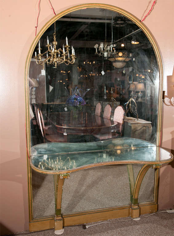 French Louis XVI style vanity, polychromed frame, circa 1940s, domed mirror with a serpentine console attached, supported by two pedestals. By Maison Jansen.
