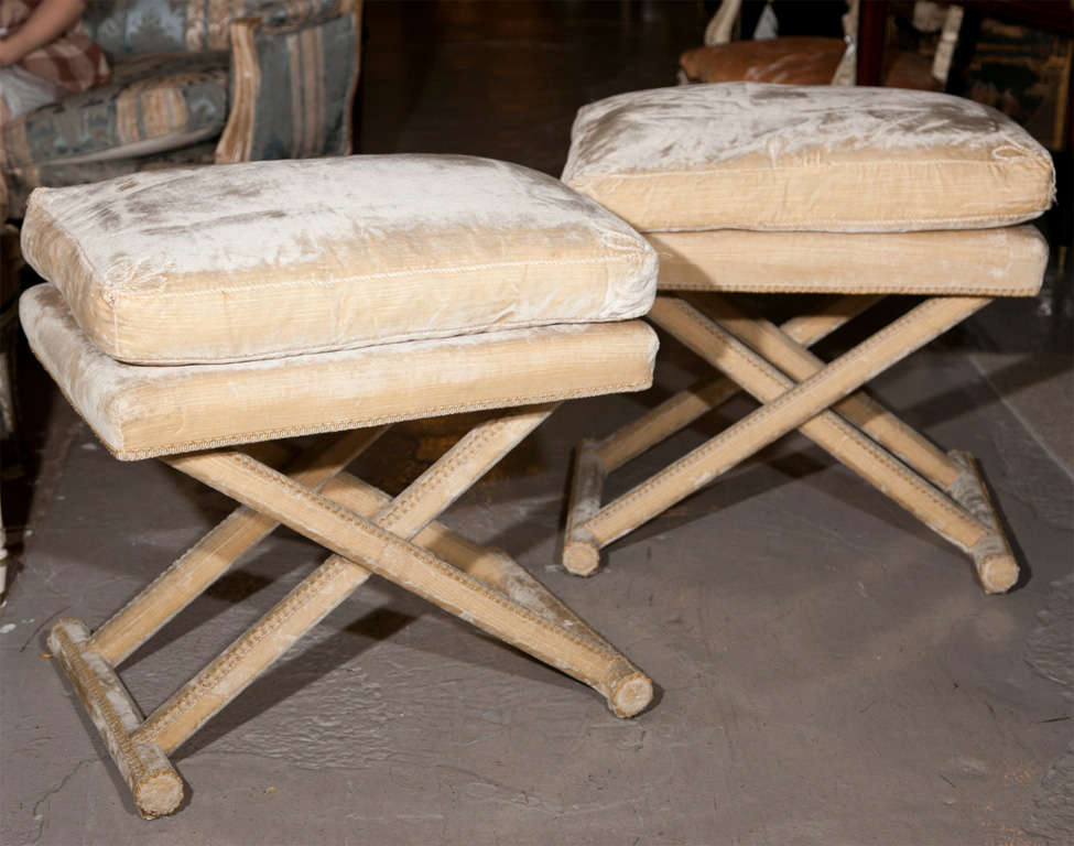 Pair of vintage stools, 1970s, each upholstered in velvet, cushioned seat on X-base.