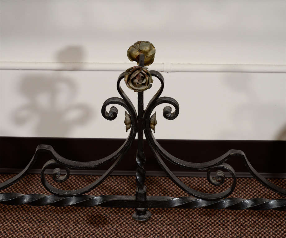 Lovely wrought iron console with gilded floral decoration and beautiful marble top.Very versatile and desirable piece