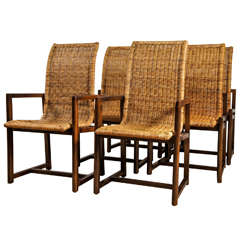 A Set of Six Rattan and Walnut Dining Chairs